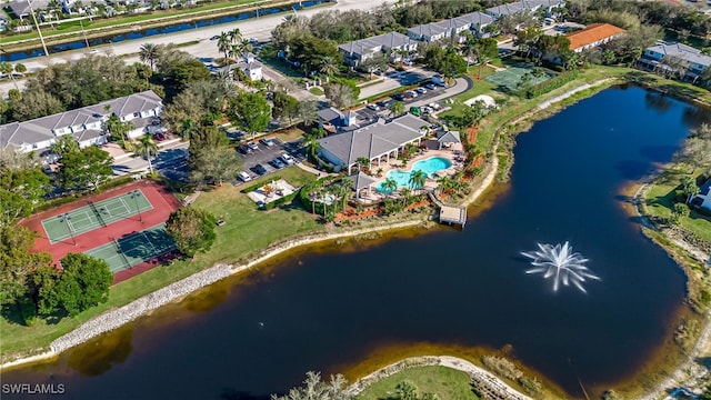 birds eye view of property featuring a residential view and a water view