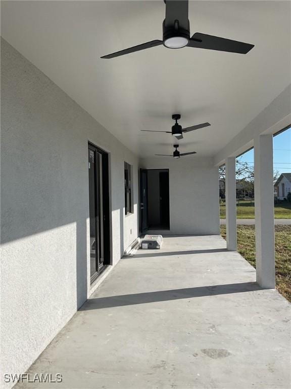 view of patio / terrace featuring a ceiling fan