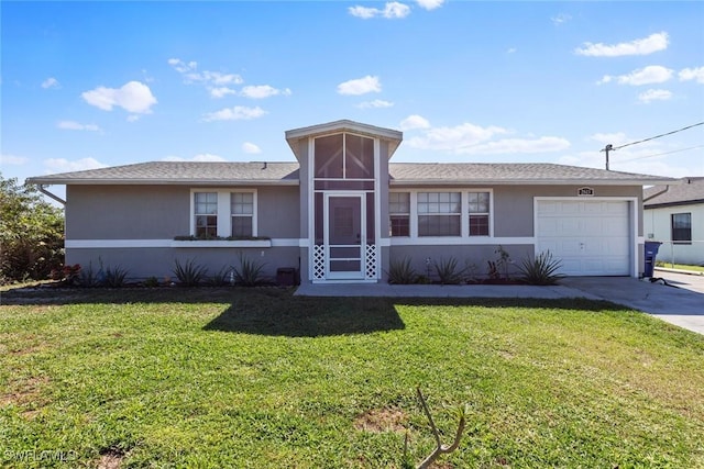 view of front facade with a front lawn and a garage