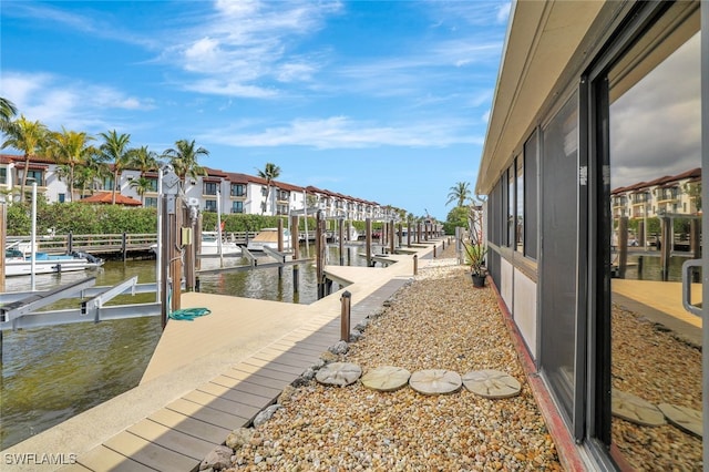 view of dock with a water view