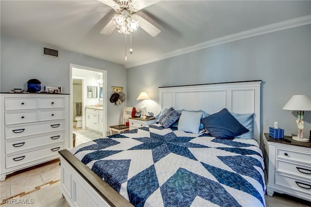 bedroom with light tile patterned flooring, connected bathroom, visible vents, a ceiling fan, and ornamental molding