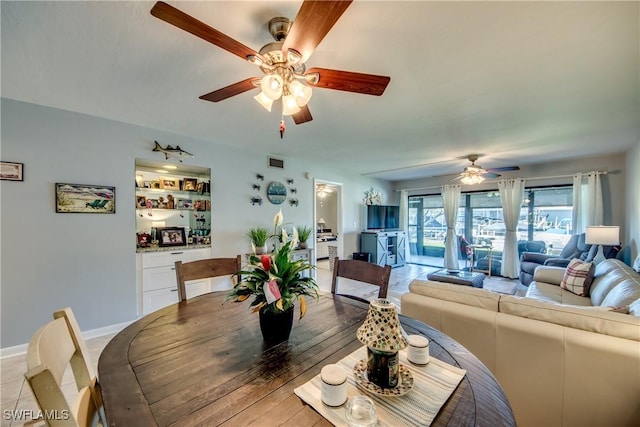 dining room featuring visible vents and baseboards