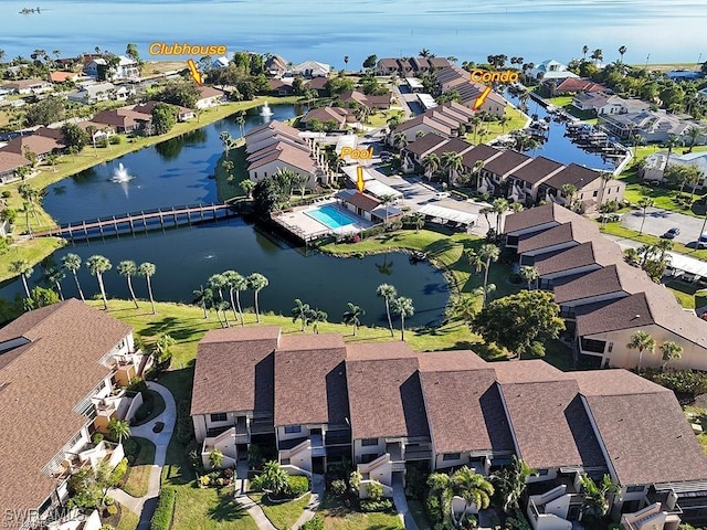 aerial view featuring a water view and a residential view