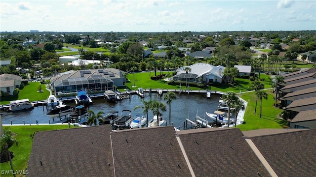 aerial view featuring a water view and a residential view