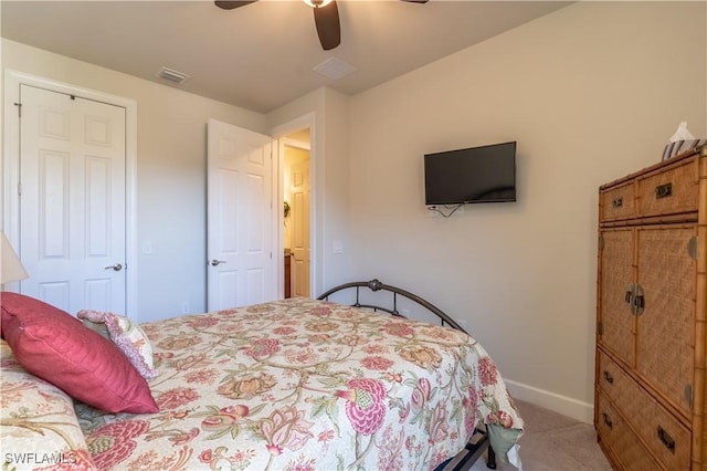 bedroom with a ceiling fan, baseboards, visible vents, and carpet flooring