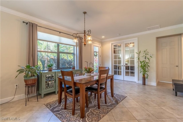 dining area featuring light tile patterned floors, french doors, baseboards, and crown molding