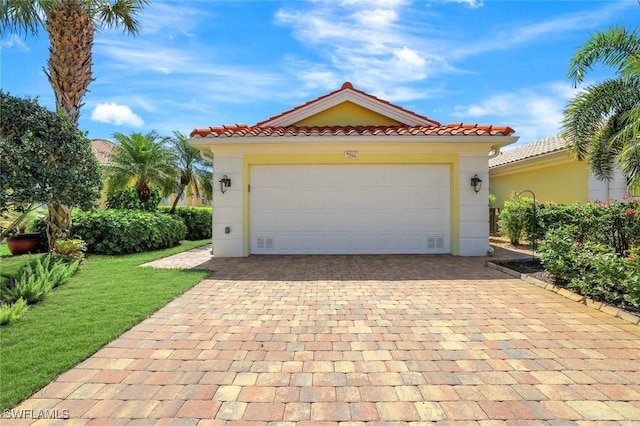 exterior space with decorative driveway