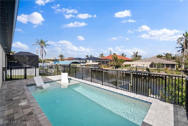 view of pool featuring a water view and glass enclosure