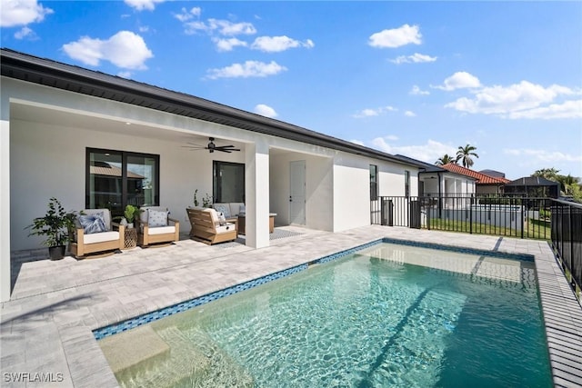 view of pool featuring an outdoor hangout area, ceiling fan, and a patio area