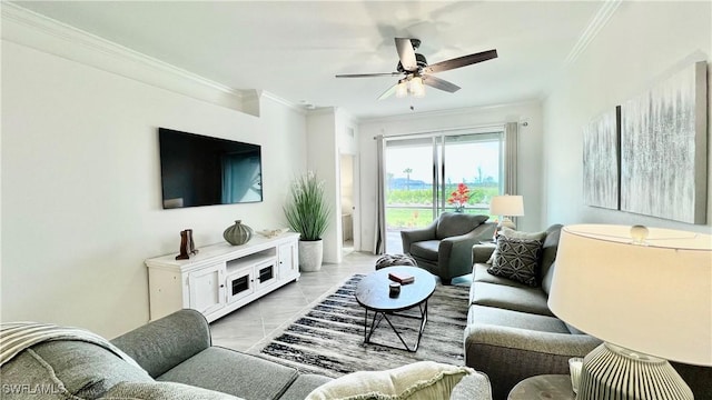 living room with ceiling fan and crown molding