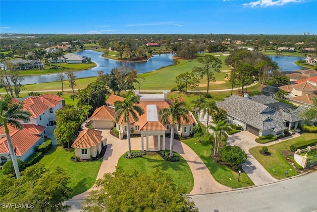 aerial view with a water view and a residential view