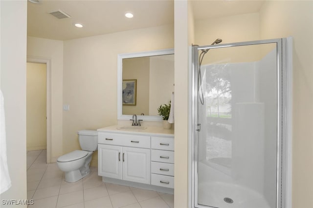 bathroom featuring visible vents, toilet, vanity, a shower stall, and recessed lighting