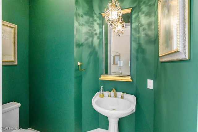 bathroom with a sink and toilet