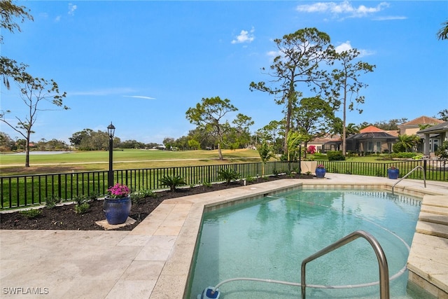 view of pool with a patio area, a fenced backyard, and a fenced in pool