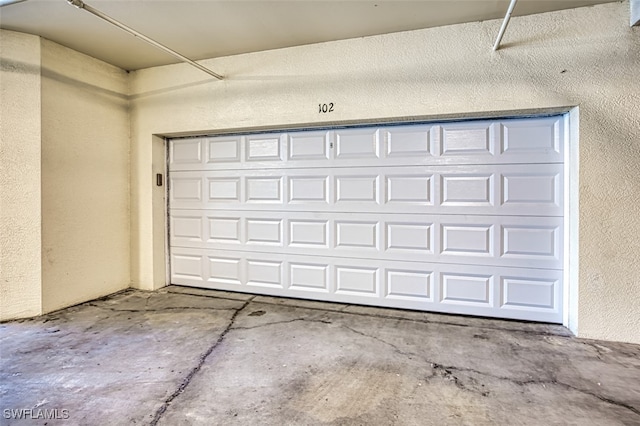 garage with a textured wall