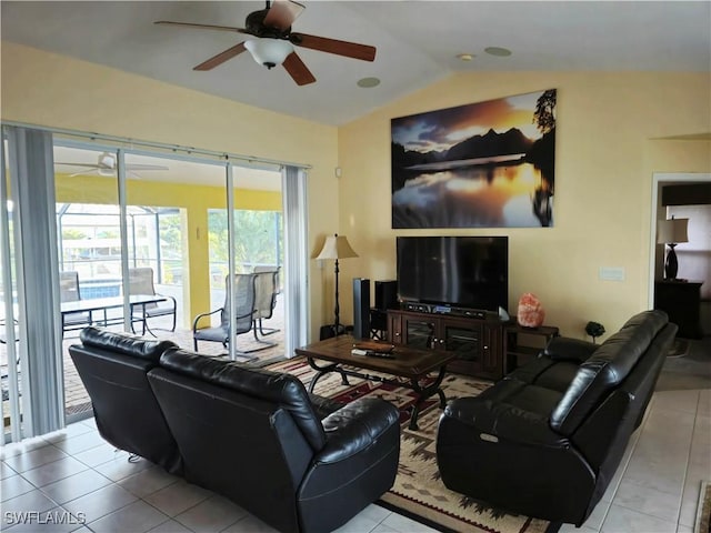 142 SE 30th Ter, Cape Coral, FL 33904 - living area featuring ceiling fan, lofted ceiling, and tile patterned flooring