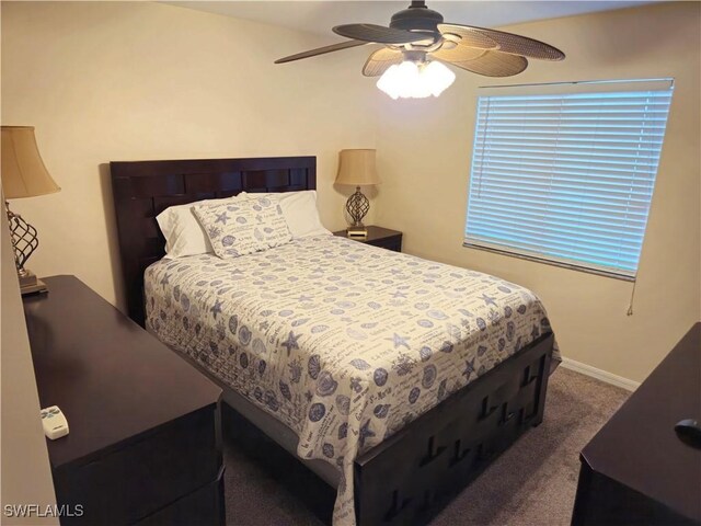 142 SE 30th Ter, Cape Coral, FL 33904 - carpeted bedroom with ceiling fan and baseboards