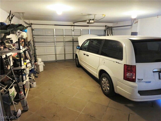 142 SE 30th Ter, Cape Coral, FL 33904 - garage with a garage door opener