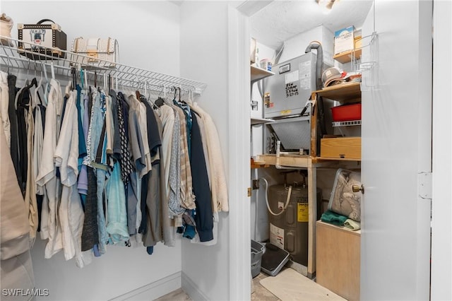 walk in closet with electric water heater