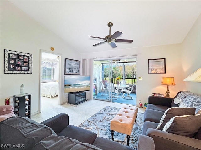 carpeted living room featuring lofted ceiling and ceiling fan