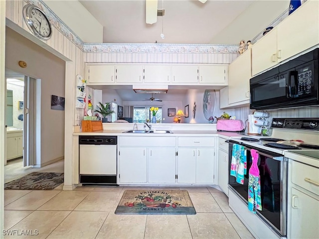 kitchen with white appliances, ceiling fan, white cabinetry, and sink