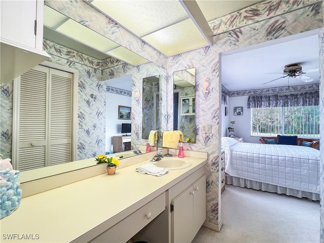 bathroom with vanity and ceiling fan