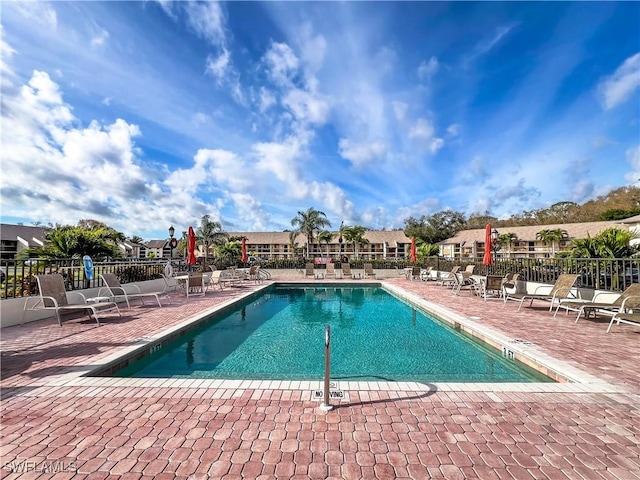 view of pool featuring a patio area