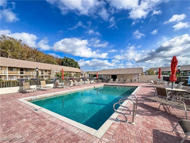 view of pool featuring a patio area