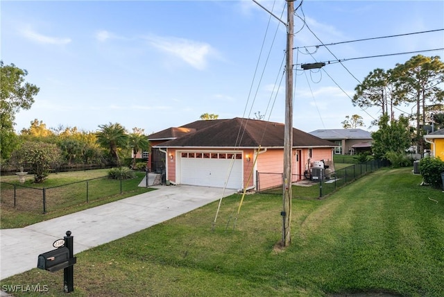 ranch-style home with a front lawn and a garage