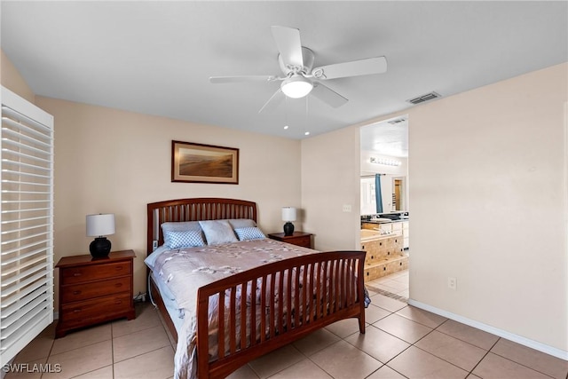 bedroom with light tile patterned floors, a ceiling fan, visible vents, and baseboards