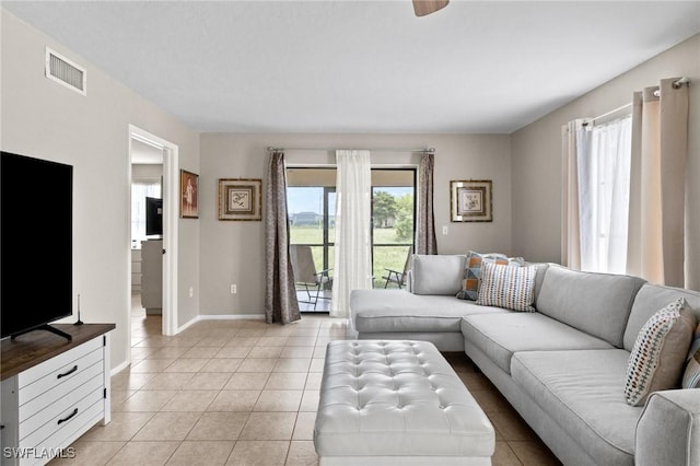 living room with light tile patterned floors