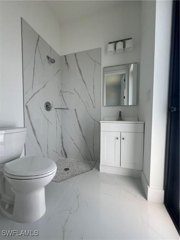 full bath featuring marble finish floor, toilet, and a marble finish shower