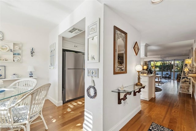 hall featuring dark wood-type flooring