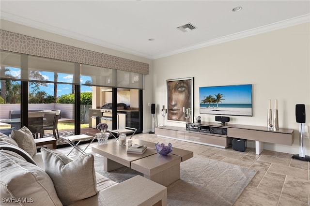 living room featuring stone tile floors, baseboards, visible vents, recessed lighting, and ornamental molding