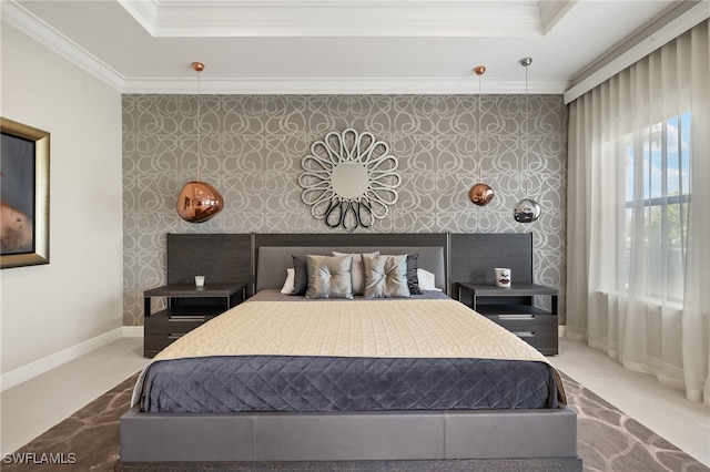 bedroom featuring a raised ceiling, ornamental molding, carpet flooring, wallpapered walls, and baseboards