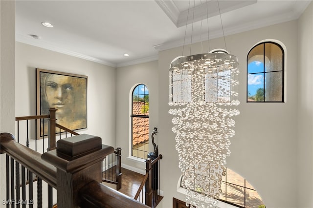 details with an inviting chandelier, recessed lighting, baseboards, wood finished floors, and ornamental molding