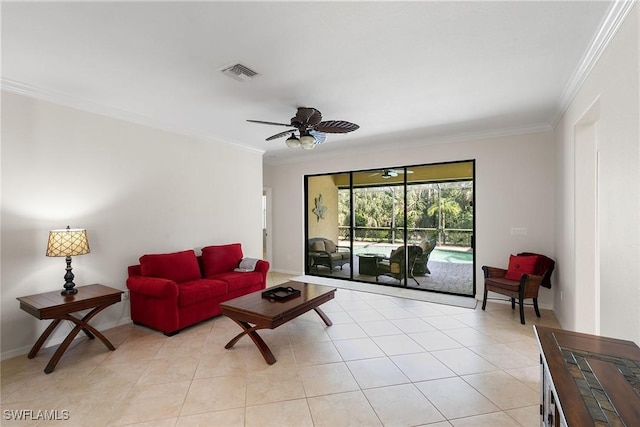 tiled living room with ceiling fan and ornamental molding