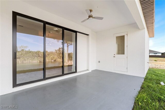 view of patio with ceiling fan