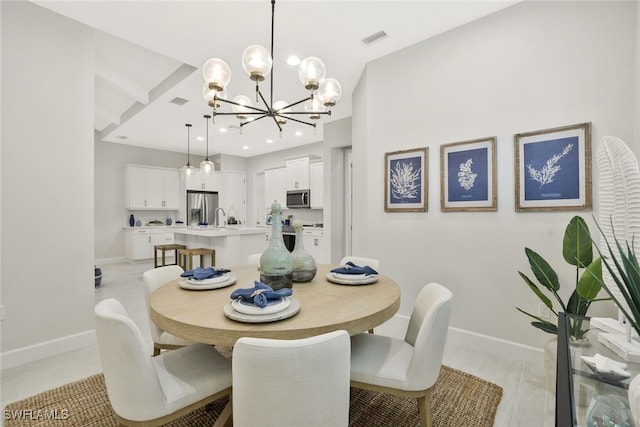 dining area with a chandelier