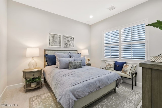 bedroom featuring wood-type flooring