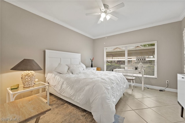 bedroom featuring ceiling fan, baseboards, crown molding, and tile patterned floors