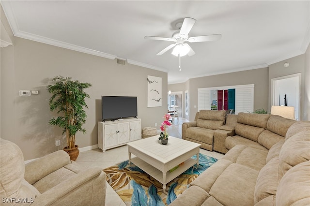 living area featuring light tile patterned floors, visible vents, ornamental molding, ceiling fan, and baseboards