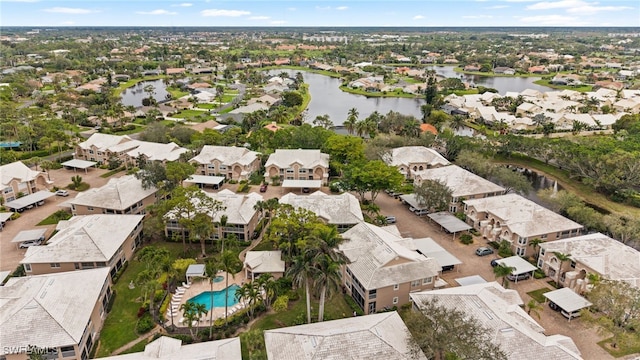 aerial view featuring a water view and a residential view