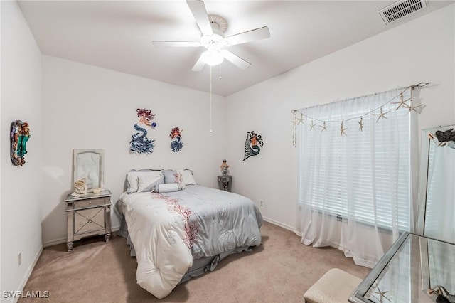 bedroom featuring ceiling fan and carpet flooring