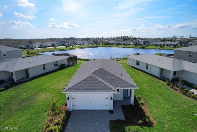 birds eye view of property featuring a water view