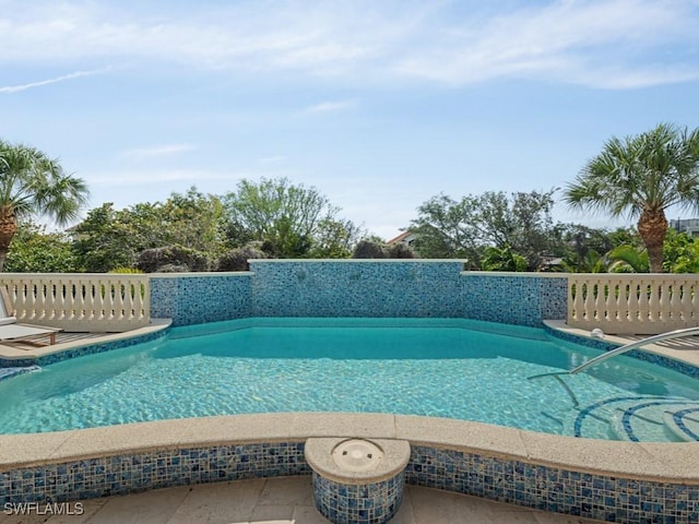 view of pool featuring a fenced in pool and a patio