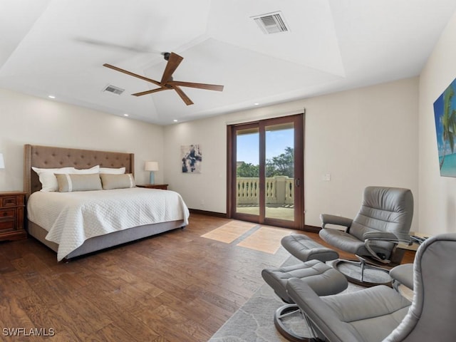 bedroom featuring visible vents, wood finished floors, a ceiling fan, and access to outside