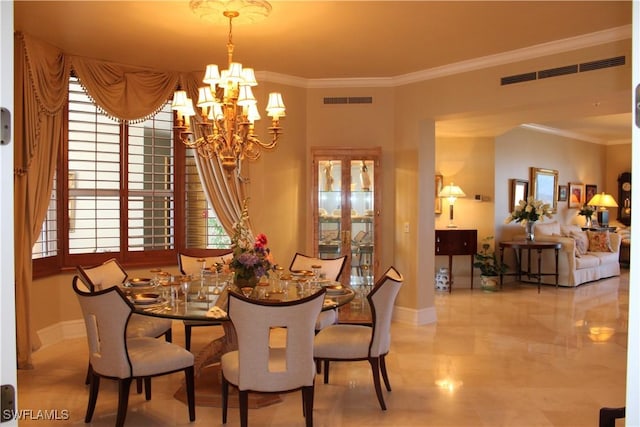 dining room featuring a healthy amount of sunlight, visible vents, and crown molding