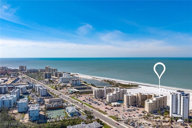 bird's eye view featuring a view of city, a water view, and a view of the beach