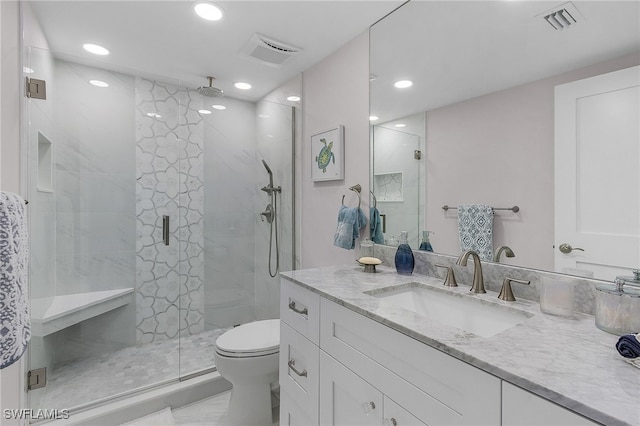 full bathroom featuring a stall shower, visible vents, toilet, vanity, and recessed lighting